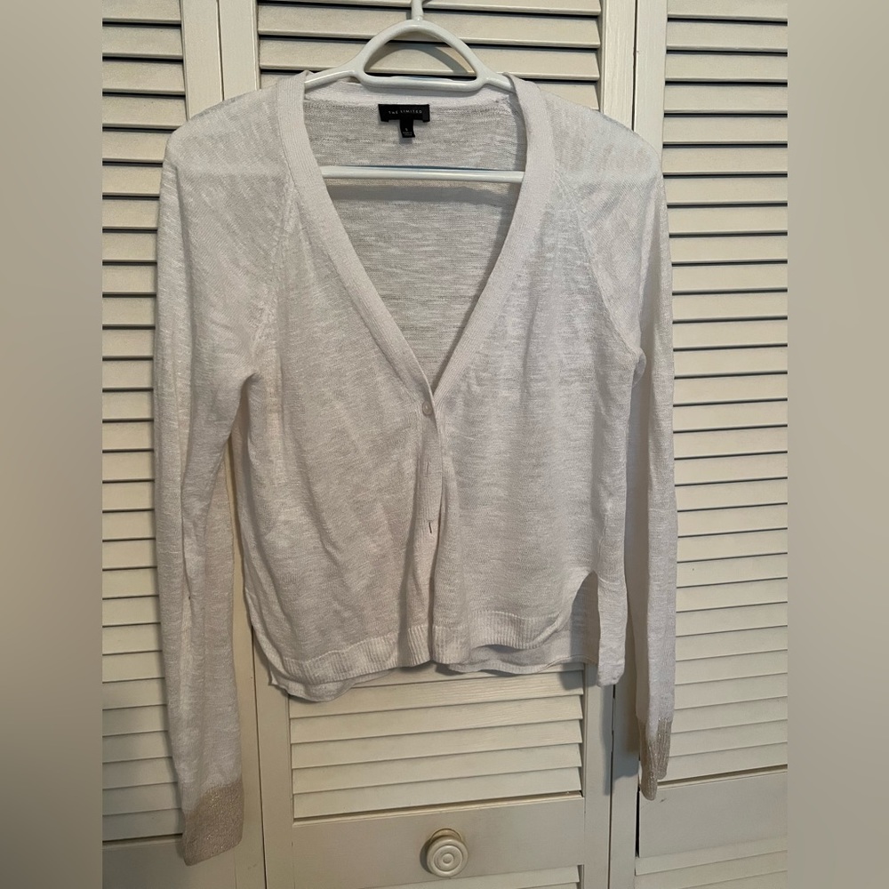 White sweater from The Limited size small. Gold trim on are sleeves.